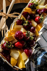 fruit cake with raw fruits on top