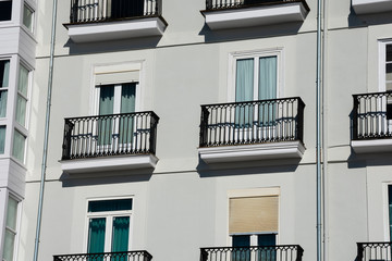 Old building facade and balconies. Santander, Spain