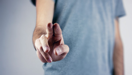 Obraz premium Hand pushing on a touch screen.