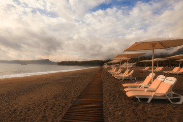 Fototapeta na wymiar beach with chairs and umbrellas