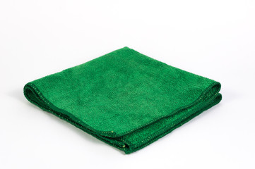 Close up Green Microfiber towel fold isolated on white background