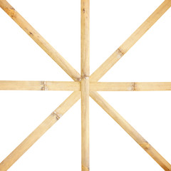 Bamboo stick cross isolated on white background