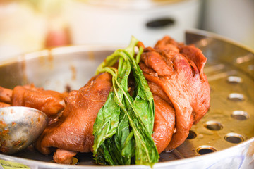 Stewed leg pork and Chinese Kale with sweet gravy sauce / style chinese food on steamed pot