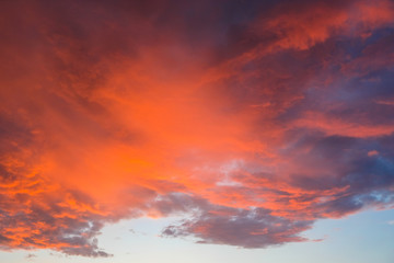Dramatic clouds on the sky before sunset.