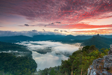 Fototapeta na wymiar Mist Sunrise at Bukit Tabur (Tabur Hill) & Mountain scenery