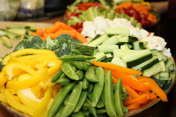 Healthy vegetable platter with mix of nutritious green, yellow, red and orange vegetables