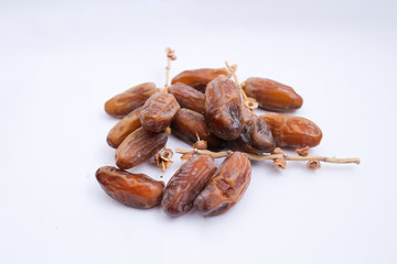 Kurma or dates fruits isolated on white background