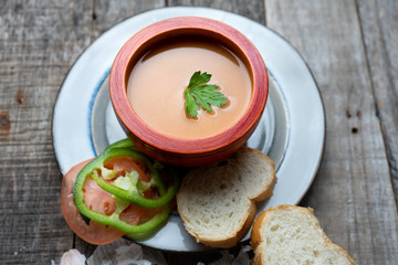 Spanish tomato gazpacho soup with garlic, bread and green pepper