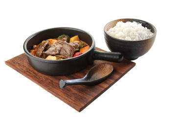 meat and vegetables main dish with rice side dish
