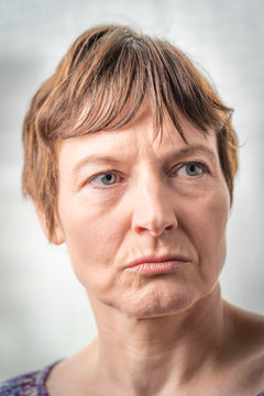Paris, France - 05 19 2019: Studio photo session with my girlfriend. Woman with expressive face and blue eyes