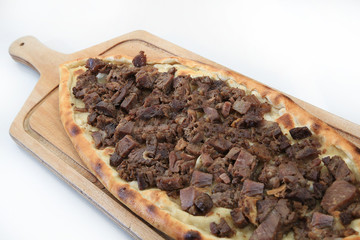 cubed roasted beef on turkish pizza pide