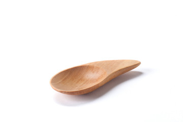 Close up Wood spoon isolated on white background shoot in the studio with space for copy.