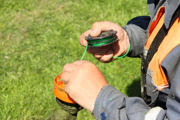 Lawn mower Assembly coil with filled line in trimmer rotor - technical service of garden tools