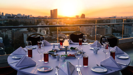 fancy sunset table on roof tea time