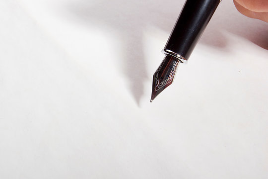 Fountain pen on a sheet of paper