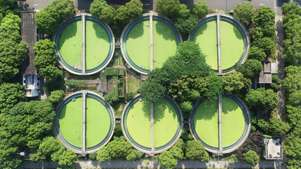 A sewage treatment plant covered with green vegetation in the central city of Shanghai