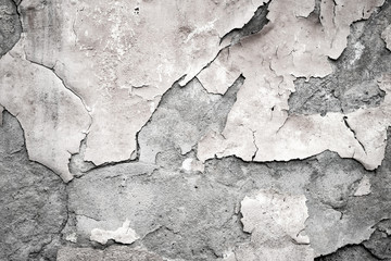 Obraz premium Fragment of the old wall with decaying and fallen off plaster