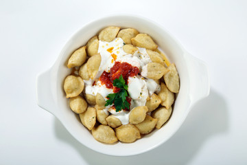 turkish traditional food named manti top view isolated