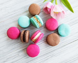 Colorful macaroons and tulips