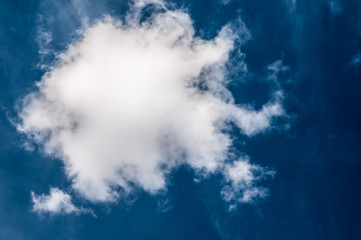 fluffy white cloud on air clear blue sky weather background. high contrast
