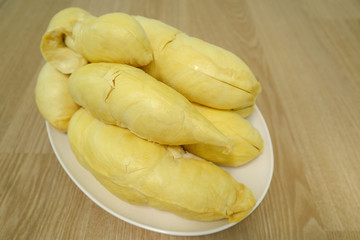 Durian Monthong Tropical fruit, bright yellow, very tasty.