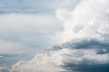 fluffy white cloud on air clear blue sky weather background. high contrast