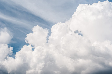 Naklejka na ściany i meble fluffy white cloud on air clear blue sky weather background. high contrast
