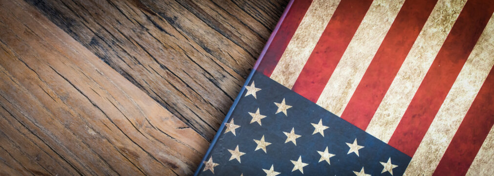 American flag texture on wooden background. Celebration banner for Memorial Day, Independence Day and Presidents Day.