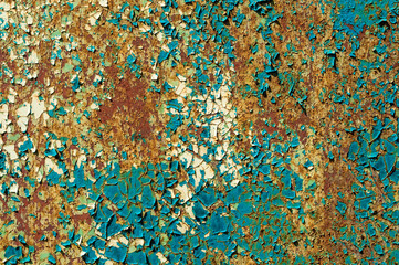 Cracked paint on a metal surface. Background