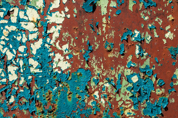 Cracked paint on a metal surface. Background