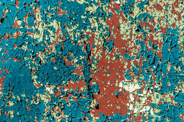 Cracked paint on a metal surface. Background