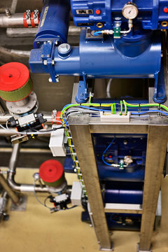 Vacuum pumps with air filters over one another.