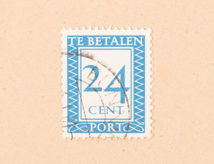 THE NETHERLANDS 1950: A stamp printed in the Netherlands shows it's value, circa 1950