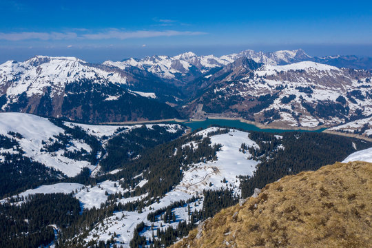 Mountains in Switzerland, with view on the arch dams Hongrin