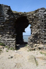 Passage in a stone fortress standing on top of a mountain in Spain.