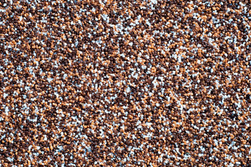background in the form of colored plaster of small pebbles