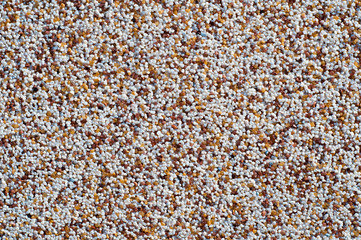 background in the form of colored plaster of small pebbles