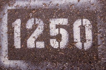 the numbers on the asphalt 1250