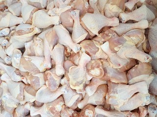 Top view of raw chicken meat as a background in the market for sale at Thailand, fresh meat for cooking