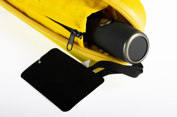 Compact waterproof umbrella with sleeve in hard case isolated on white