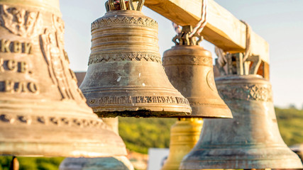 Old bells on a background of mountains