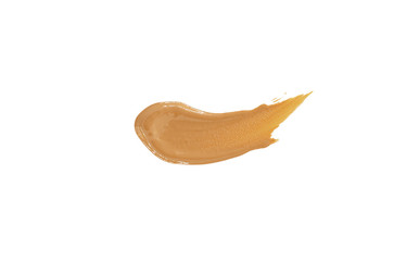 smeared spot of a beige corrector (tonal basis) is isolated on a white background.