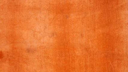 Hintergrund: Rotbrauner Mauerputz mit Spuren