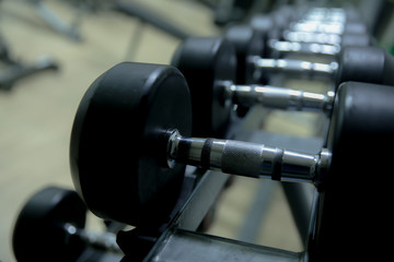 Fototapeta premium Fitness equipment in the fitness room