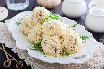 Serving balls with mushrooms in the form of balls with cheese, raffaello, horizontal