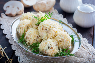 Serving balls with mushrooms in the form of balls with cheese, raffaello, horizontal