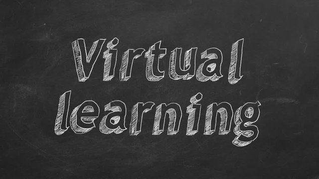 Hand drawing "Virtual learning" on black chalkboard. Stop motion animation.