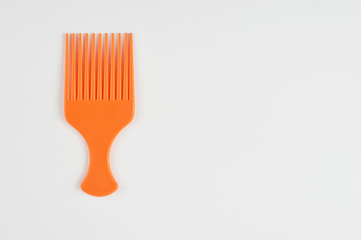 Plastic comb isolated on white background