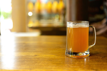 close up front view glass of craft beer on table in the restaurant  for modern city lifestyle 