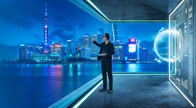 Businessman in suit working with virtual 3d holographic interface screens . Futuristic business, technology, internet and social networking technology concept .